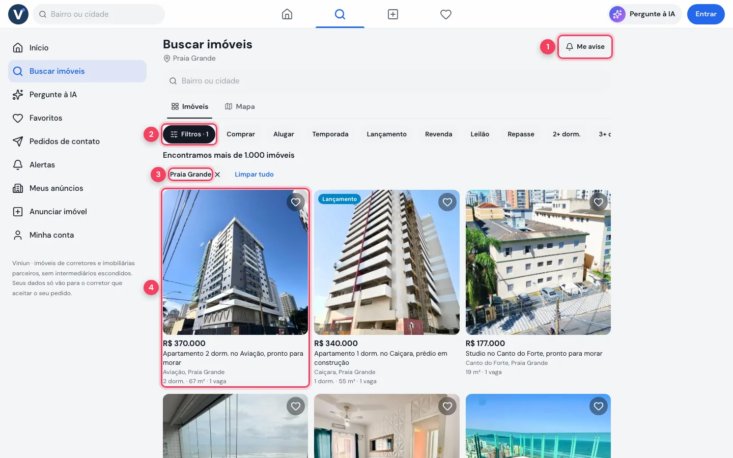 Busca de imóveis no computador filtrada por Praia Grande, com o botão Me avise